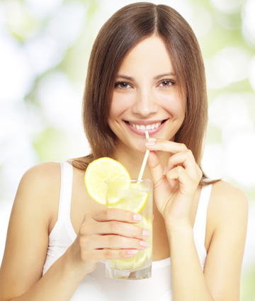 woman with water and lemonade