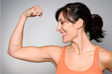 woman flexing arm muscles