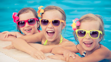 3 children in swimming pool