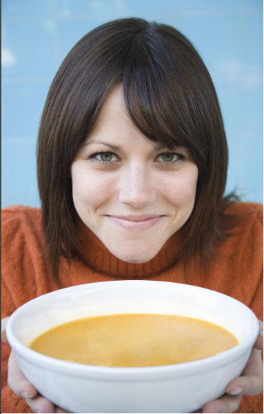 lady eating wild mushroom flavor soup