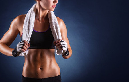 woman after workout with towel