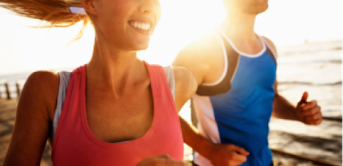 couple running on beach