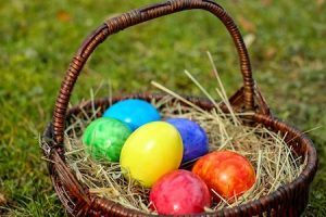 Easter basket with colorful eggs