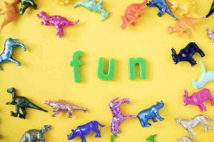 plastic animals and letters spelling fun