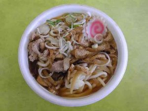 strofoam bowl with udon noodle soup